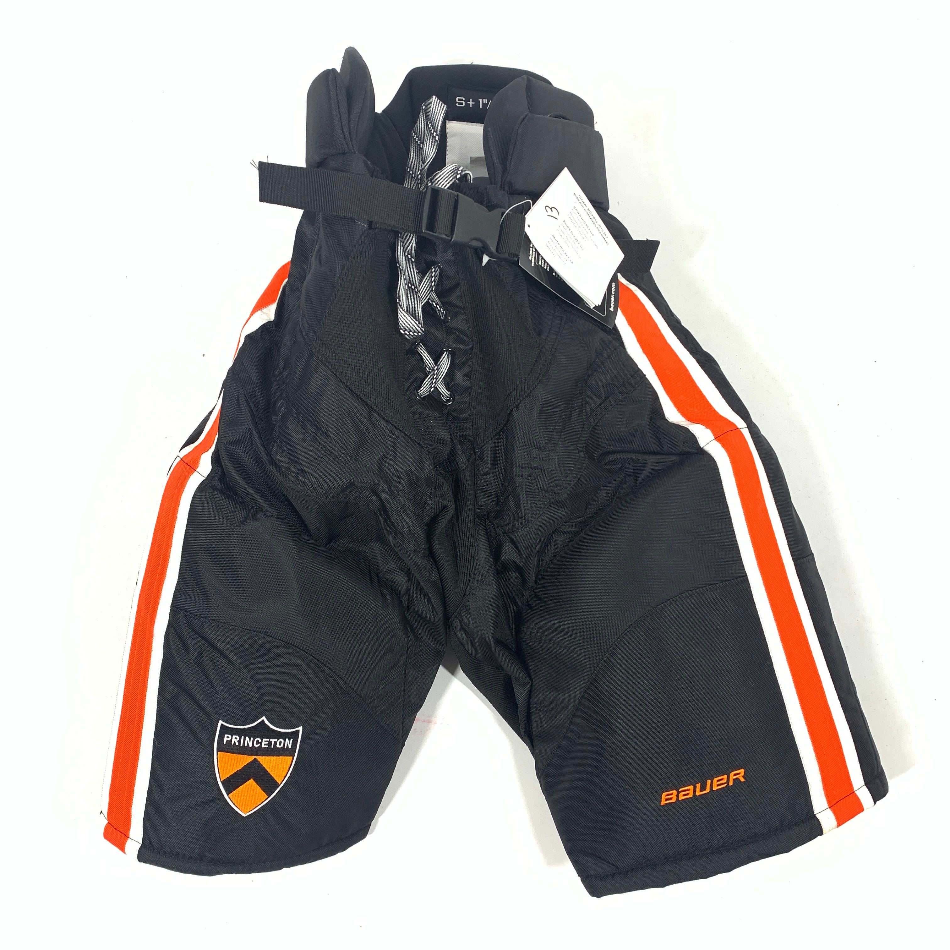 Bauer Nexus - Pantalon de hockey Pro Stock NCAA pour femme (noir/orange)